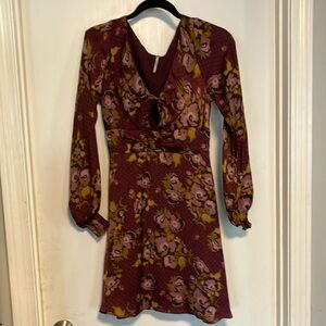 Excellent pre-owned Free People size 6 smoked long sleeve dress.